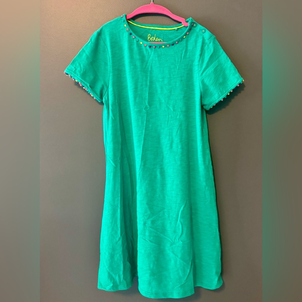 Boden Girls Dress. Size 11-12. Green with rainbow colored pom pom trim.